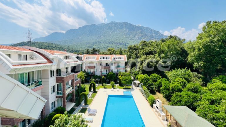 Apartment in Aslanbudcak, Kemer with pool - buy realty in Turkey - 107043