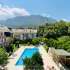 Apartment in Aslanbudcak, Kemer with pool - buy realty in Turkey - 107035